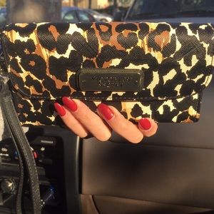 Victoria’s Secret wallet/phone holder.